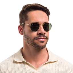 Shop Ray-Ban Round Metal Sunglasses in Gold online.