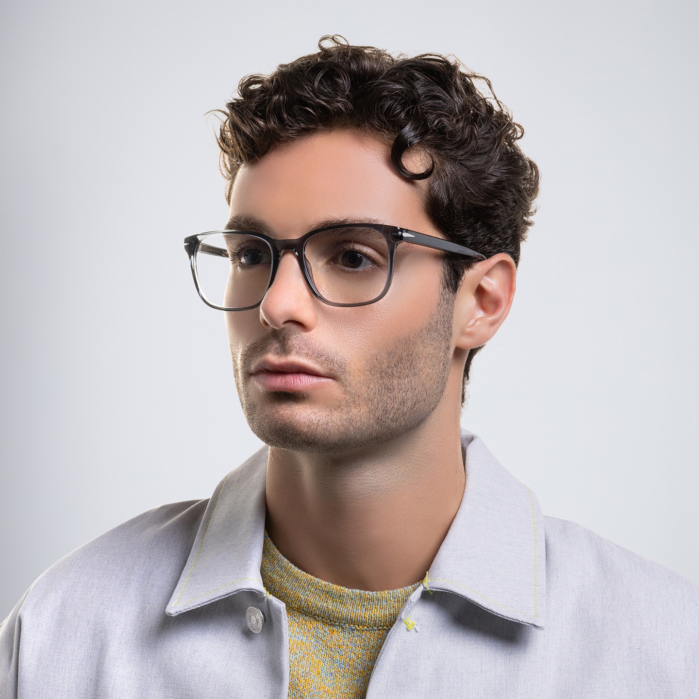 Shop DAVID BECKHAM Wide Rectangle Eyeglasses in Transparent Grey online.
